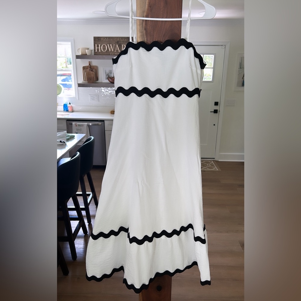 Cute white dress! Only worn and washed once. Perfect for summertime.